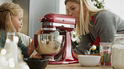 Video of children next to electric mixer during Christmas baking