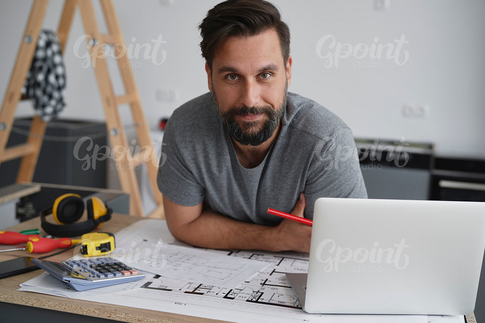Portrait of  carpenter on site working