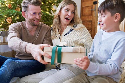 Family sharing the Christmas presents