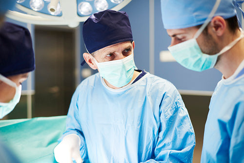 Male surgeons during the very important operation