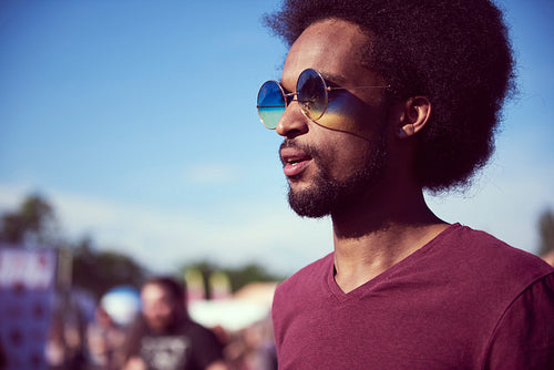 Shot of young African man with sunglasses