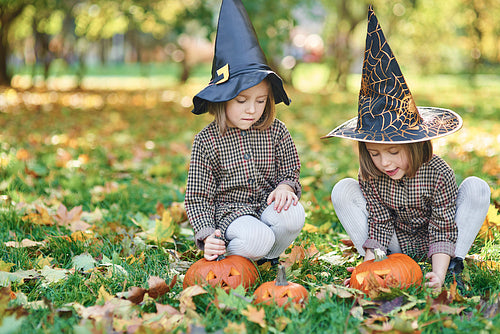 Twins in witch costume during Halloween time