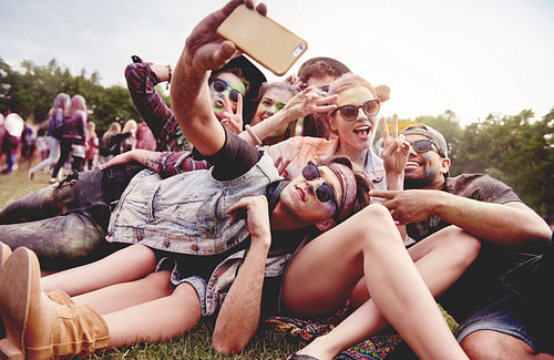 Friends making selfie at the summer festival