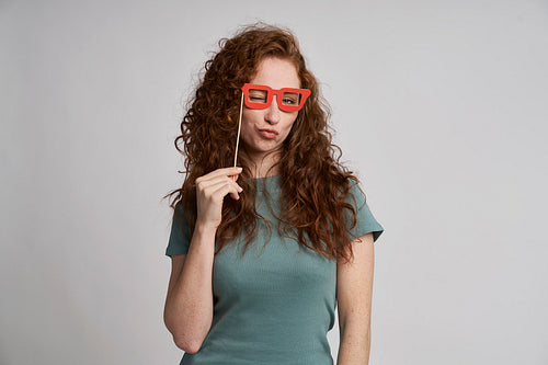 Young woman with funny glasses