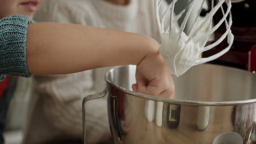 Video of child tasting sugar paste during Christmas baking