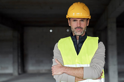 Portrait of mature caucasian man on the construction site