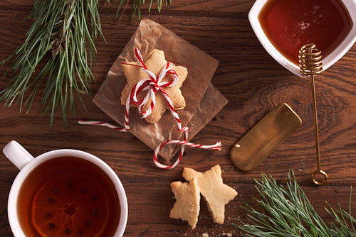 Gingerbread cookies and hot tea with lemon and honey