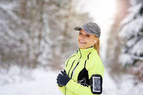 Portrait of smiling woman running with good mood