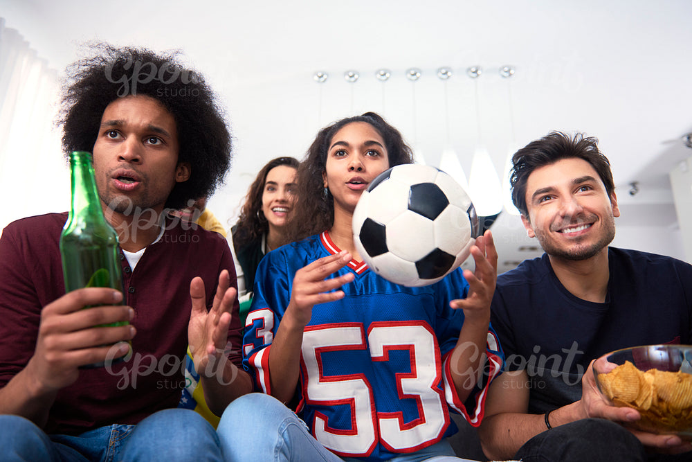 Football fans watching match and waiting for the goal