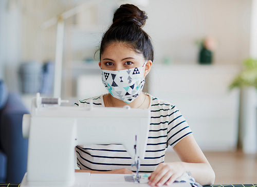 Portrait of Asian manufacturer in pollution mask