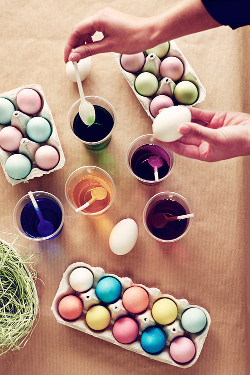 High angle view of coloring boiled eggs