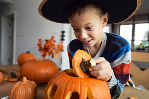 Little boy with Halloween's pumpkin