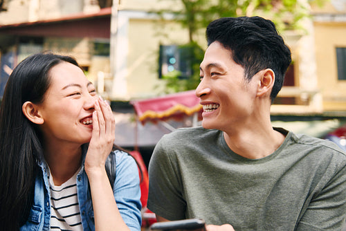 Young couple laughing in the city