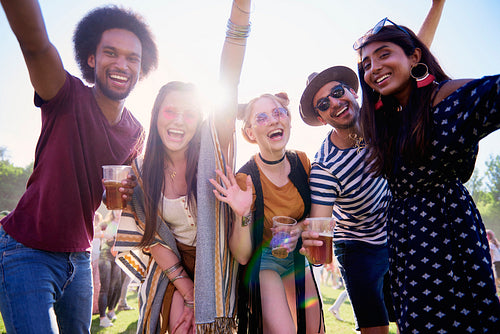 Portrait of young adult friends having fun at festival