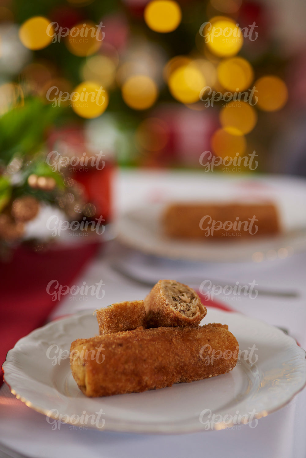 Plate with croquette on Christmas table