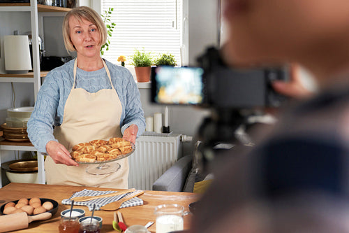 Senior mother  filmed while cooking