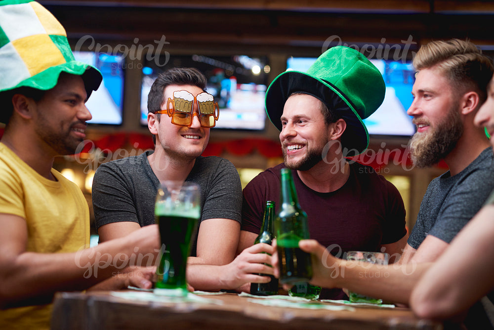 Group of friends spending time together in the pub
