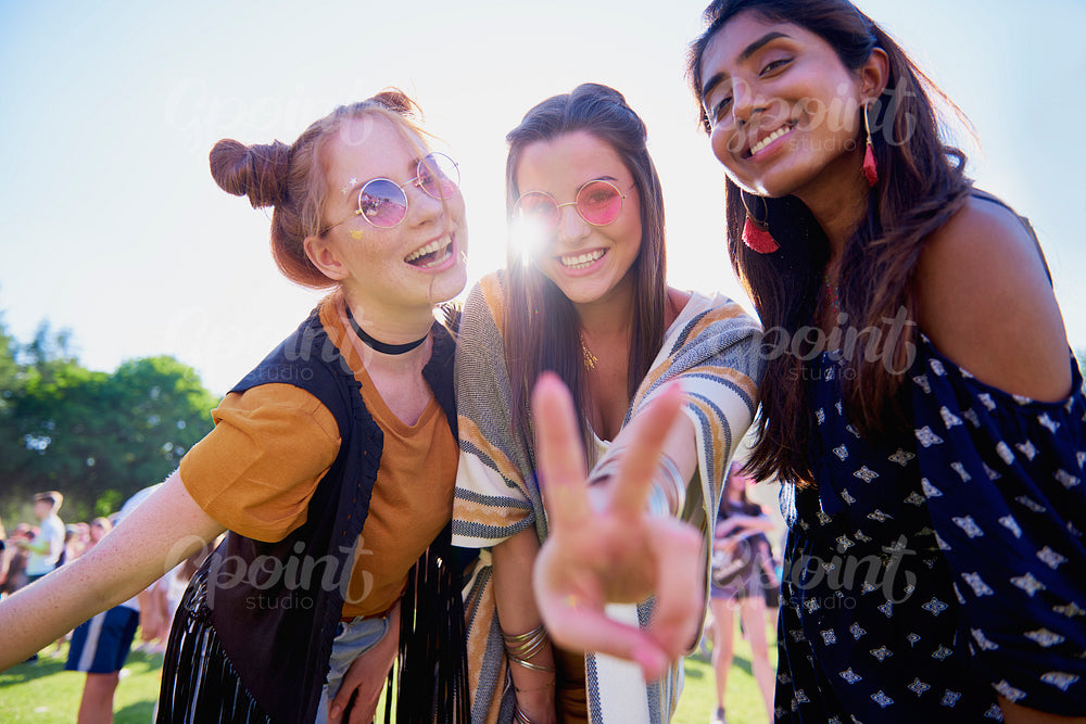 Peace sign and three friends