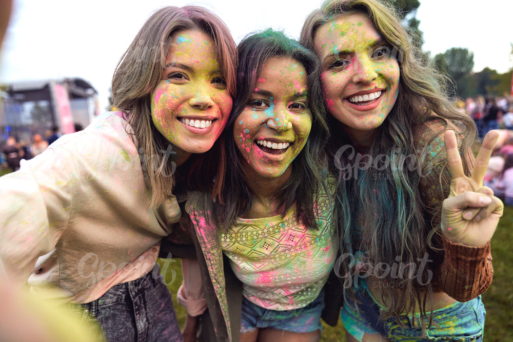 Group of friends spending time together at Holi Festival  