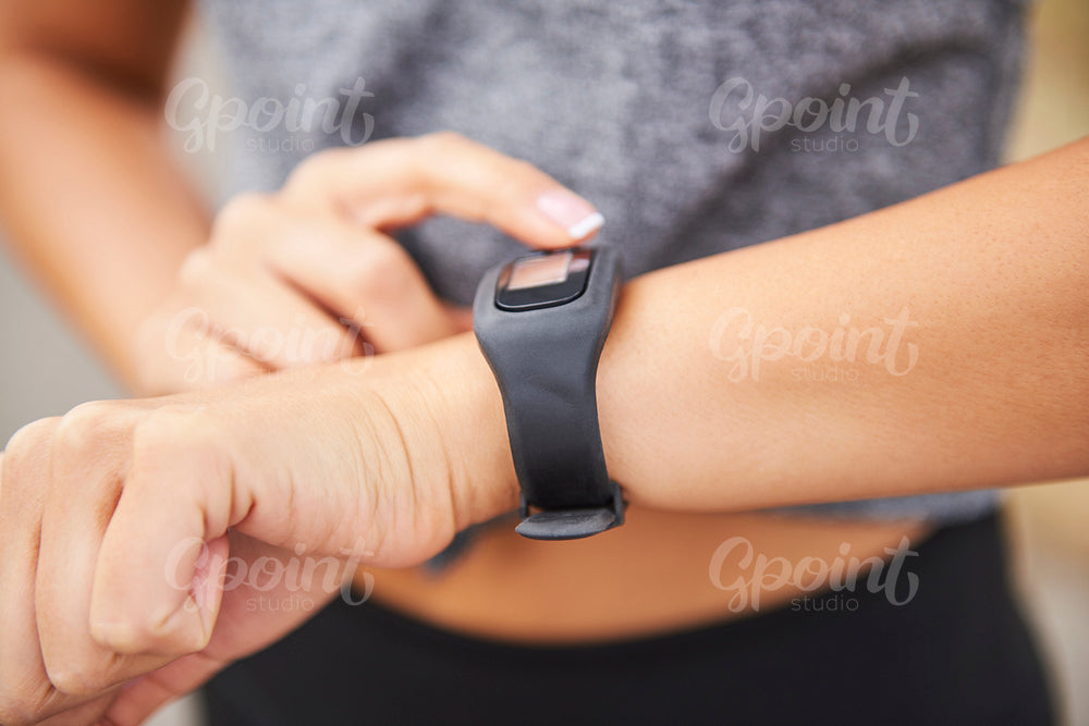 Woman checking how many calories she burned