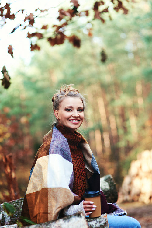 Portrait of beautiful woman in the forest autumn