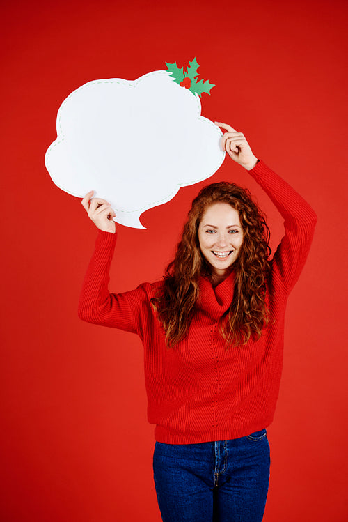 Portrait of smiling girl with speech bubble