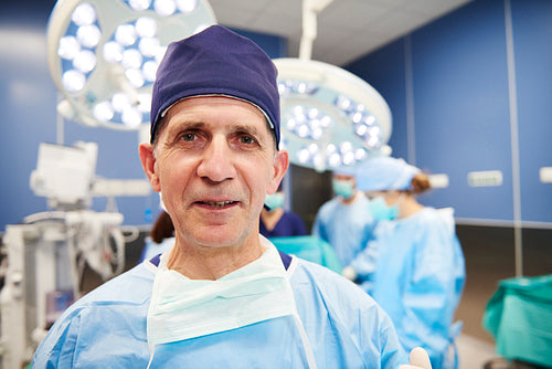 Portrait of smiling surgeon in the operating room