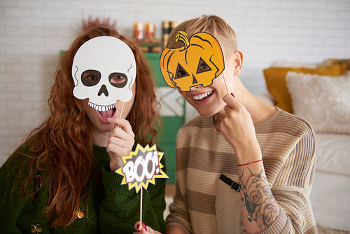 Girls with funny halloween masks