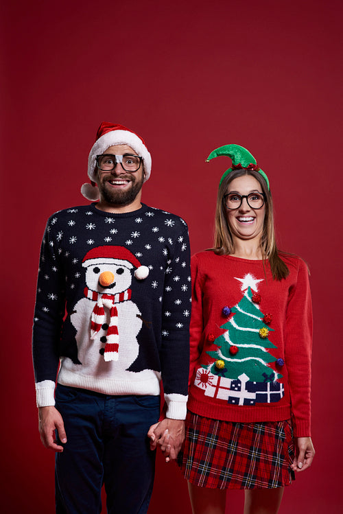 Portrait of couple in Christmas clothes