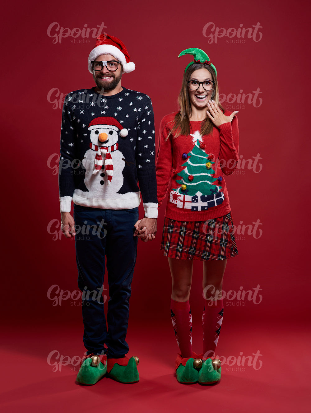 Cute couple in Christmas clothes