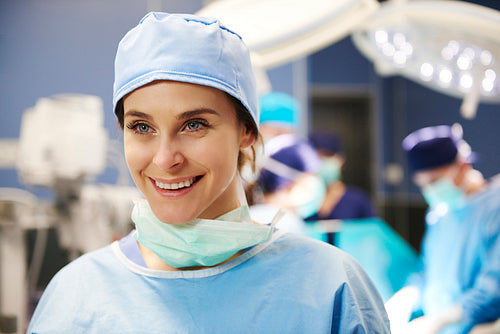 Portrait of female surgeon in operating room