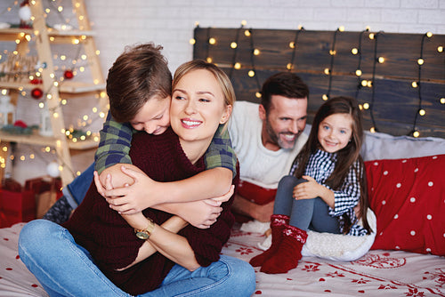 Family spending Christmas together at home