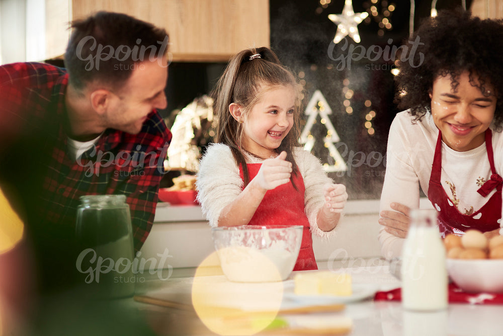 Family enjoying in the kitchen at Christmas