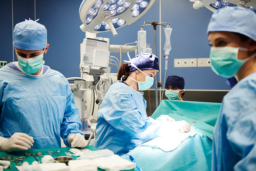 Operating room and team of surgeons