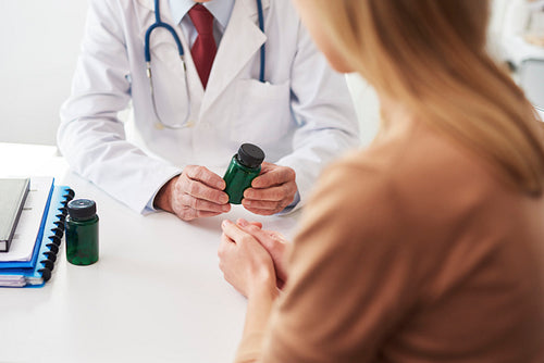 Doctor recommending medicine to the patient