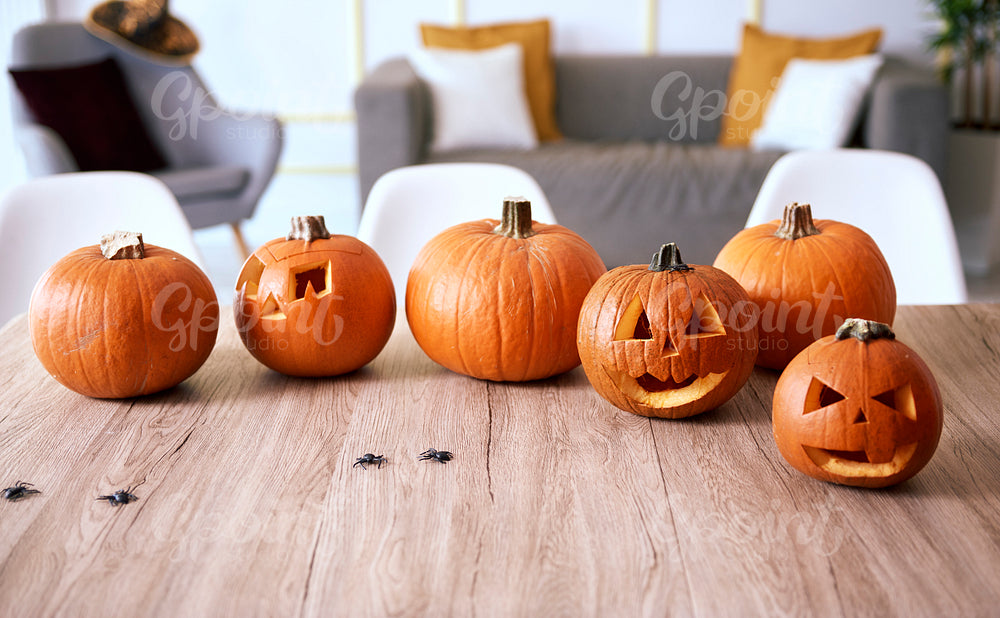 Halloween pumpkins on wooden table
