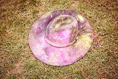 Festival hat lying on the grass