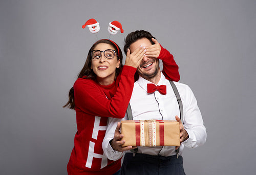 Funny Christmas nerds with gift