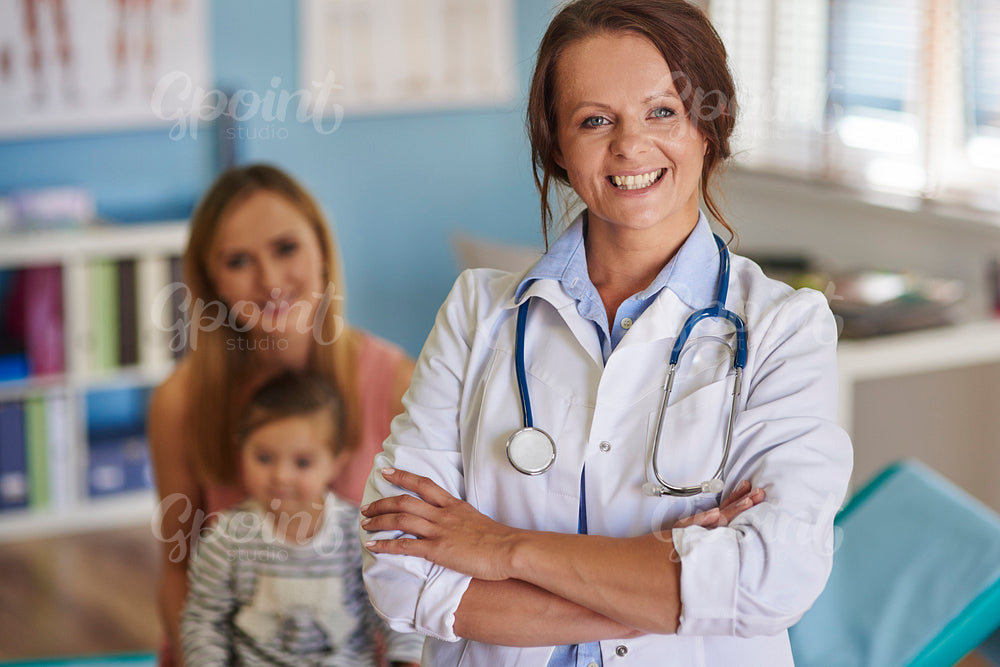 Cheerful doctor and her patients