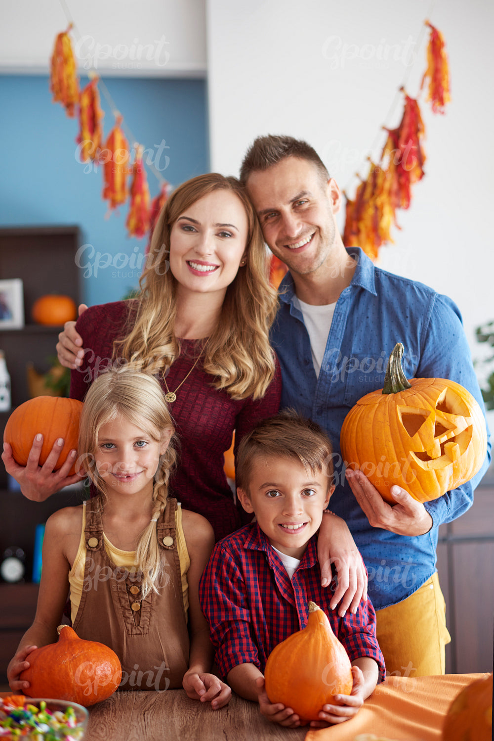 Portrait of cheerful family during halloween