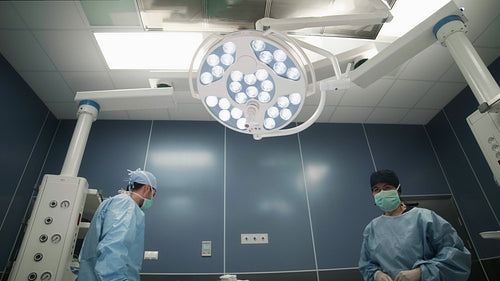 Team of surgeons at operating room