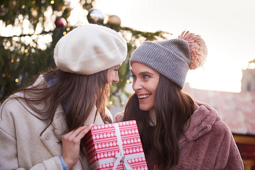 Two women with one Christmas gift