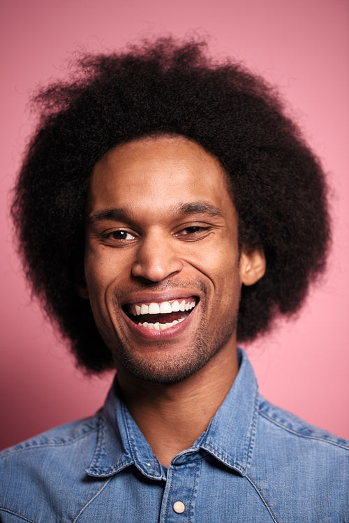 Close up portrait of happiness African man in studio shot.