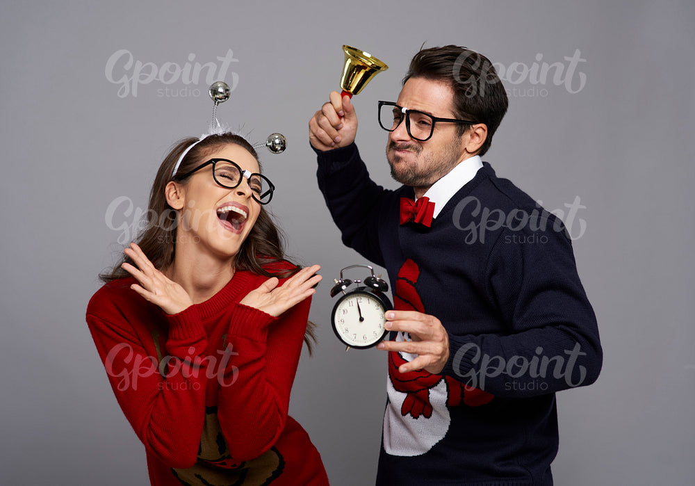 Funny couple announcing the Christmas time