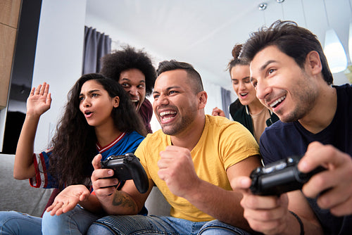 Friends have fun while playing on the game console