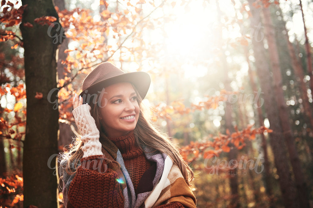 Beautiful woman in autumnal forest