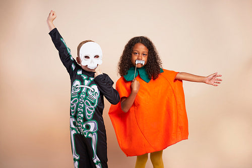 Cheerful children with Halloween costume