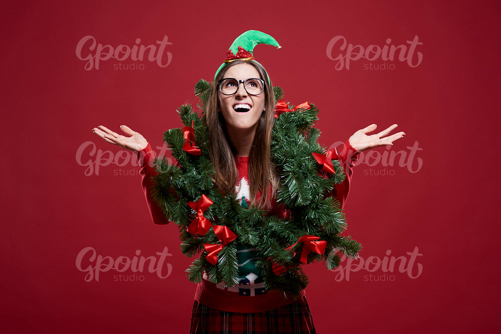 Funny woman with Christmas garland