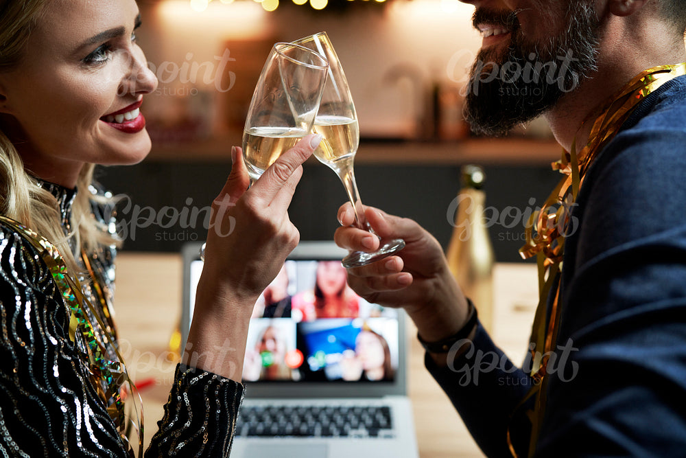 Close up of couple during the New Year's Eve toast