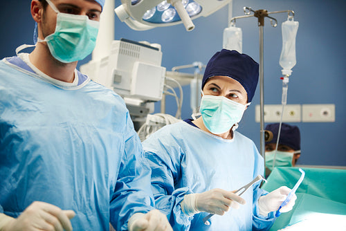 Surgeons working together while operation